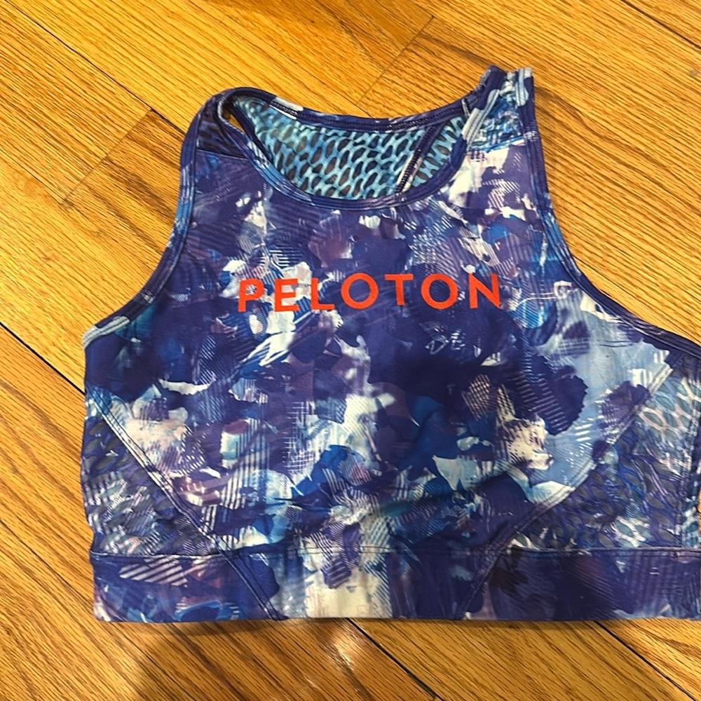 Peloton sports bra purple, blue and red
